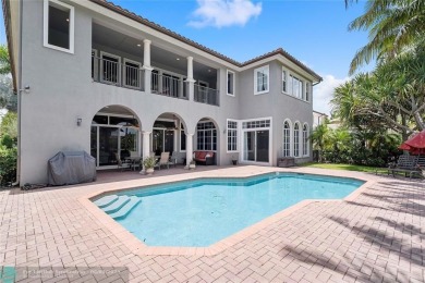 Stunning HOME in prestigious Edgewood at Heron Bay! This on Heron Bay Golf Club in Florida - for sale on GolfHomes.com, golf home, golf lot