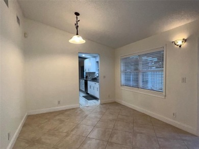 Lucky for you our buyer did not get financing so it's BACK ON on Palm-Aire Country Club and Resort - The Oaks in Florida - for sale on GolfHomes.com, golf home, golf lot