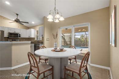 This inviting 3 bedroom, 2 bathroom pool home offers easy on Palmetto-Pine Country Club in Florida - for sale on GolfHomes.com, golf home, golf lot