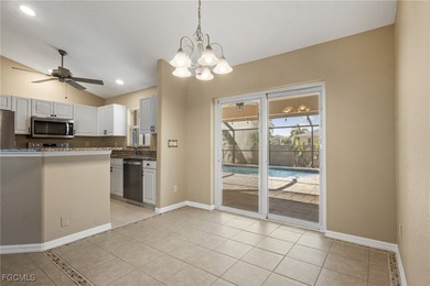 This inviting 3 bedroom, 2 bathroom pool home offers easy on Palmetto-Pine Country Club in Florida - for sale on GolfHomes.com, golf home, golf lot