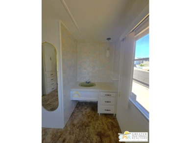 All you want is a cozy, comfortable place to live that is easy on Desert Crest Country Club in California - for sale on GolfHomes.com, golf home, golf lot