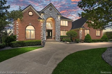 Welcome to 23790 Point O Woods Court - a stunning custom-built on River Bank Golf Course in Michigan - for sale on GolfHomes.com, golf home, golf lot