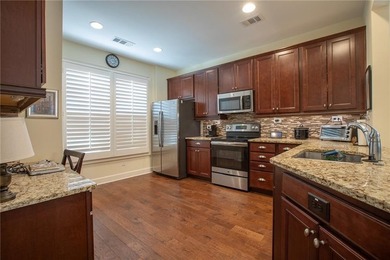 Welcome to easy, one-level living in this charming two-bedroom on Lanier Island Legacy Golf Couorse in Georgia - for sale on GolfHomes.com, golf home, golf lot