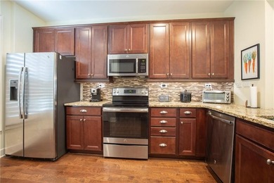 Welcome to easy, one-level living in this charming two-bedroom on Lanier Island Legacy Golf Couorse in Georgia - for sale on GolfHomes.com, golf home, golf lot