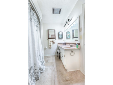 This Beautiful Brick 4BR-3.5BA home is located on an extra-large on Santee-Cooper Country Club in South Carolina - for sale on GolfHomes.com, golf home, golf lot