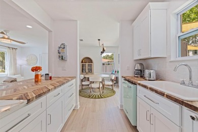 A One-of-a-Kind Dunedin Gem. Step into timeless charm with The on The Dunedin Country Club in Florida - for sale on GolfHomes.com, golf home, golf lot