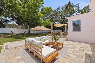A One-of-a-Kind Dunedin Gem. Step into timeless charm with The on The Dunedin Country Club in Florida - for sale on GolfHomes.com, golf home, golf lot