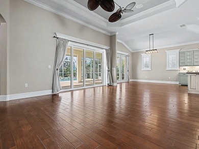 STUNNING, MOVE-IN-READY POOL HOME WITH MULTIPLE ENSUITES! Don't on Harbor Hills Country Club in Florida - for sale on GolfHomes.com, golf home, golf lot