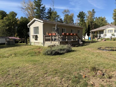 This charming lakeside retreat, offers the perfect opportunity on Willsboro Golf Club in New York - for sale on GolfHomes.com, golf home, golf lot