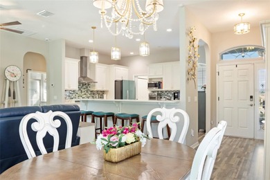 SPECTACULAR 3/2 Sycamore with a SALTWATER POOL, large screened on Stonecrest Golf and Club Club in Florida - for sale on GolfHomes.com, golf home, golf lot