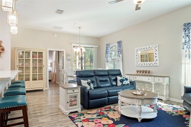 SPECTACULAR 3/2 Sycamore with a SALTWATER POOL, large screened on Stonecrest Golf and Club Club in Florida - for sale on GolfHomes.com, golf home, golf lot