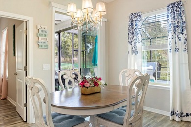 SPECTACULAR 3/2 Sycamore with a SALTWATER POOL, large screened on Stonecrest Golf and Club Club in Florida - for sale on GolfHomes.com, golf home, golf lot