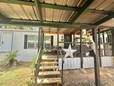 This stunning 2-bedroom, 2-bath partially furnished manufactured on Pendleton Harbor in Texas - for sale on GolfHomes.com, golf home, golf lot