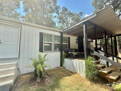 This stunning 2-bedroom, 2-bath partially furnished manufactured on Pendleton Harbor in Texas - for sale on GolfHomes.com, golf home, golf lot