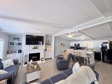 Move-In Ready 55+ Coastal Retreat with Water Views--short golf on Indigo Creek Golf Club in South Carolina - for sale on GolfHomes.com, golf home, golf lot