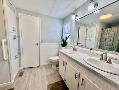 Move-In Ready 55+ Coastal Retreat with Water Views--short golf on Indigo Creek Golf Club in South Carolina - for sale on GolfHomes.com, golf home, golf lot