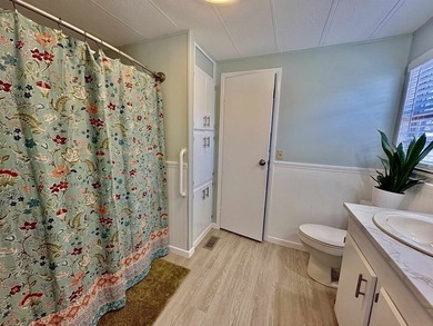 Move-In Ready 55+ Coastal Retreat with Water Views--short golf on Indigo Creek Golf Club in South Carolina - for sale on GolfHomes.com, golf home, golf lot