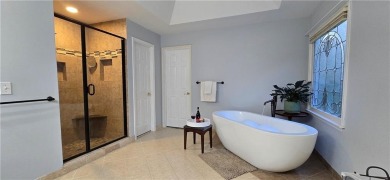 Nestled in a quiet cul-de-sac within the highly sought-after on Canongate At Eagle Watch Golf Club in Georgia - for sale on GolfHomes.com, golf home, golf lot