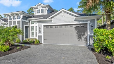 Experience luxury and functionality in this stunning 4-bedroom on Plantation Bay Golf and Country Club in Florida - for sale on GolfHomes.com, golf home, golf lot