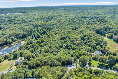 A most tranquil spot with privacy and serenity property. One of on Sandwich Hollows Golf Club in Massachusetts - for sale on GolfHomes.com, golf home, golf lot