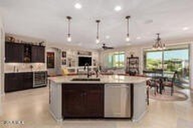 Exceptional Golf Course Home with Private Pool  Designer Kitchen on Poston Butte Golf Club in Arizona - for sale on GolfHomes.com, golf home, golf lot