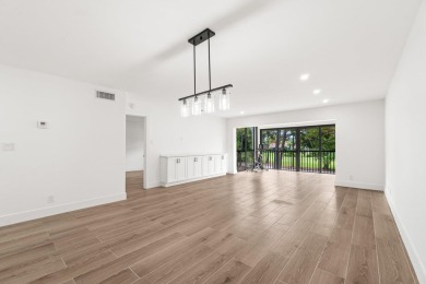 Welcome to effortless luxury and modern living! This fully on Old Marsh Golf Club in Florida - for sale on GolfHomes.com, golf home, golf lot
