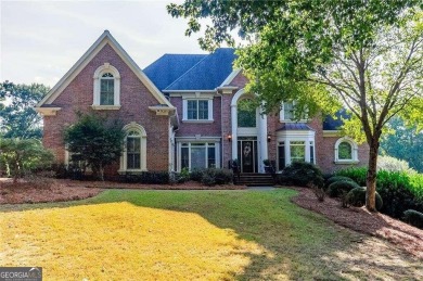 Three-level all brick home is a Sugarloaf masterpiece. Elegant on TPC At Sugarloaf Golf Club in Georgia - for sale on GolfHomes.com, golf home, golf lot