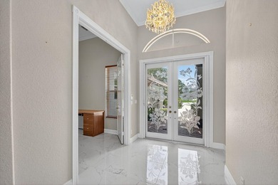 Welcome to your Lakefront Golf Course Retreat. Step into this on  in Florida - for sale on GolfHomes.com, golf home, golf lot