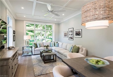 Discover refined coastal luxury in this exceptional estate on Club at Pelican Bay Golf Course in Florida - for sale on GolfHomes.com, golf home, golf lot