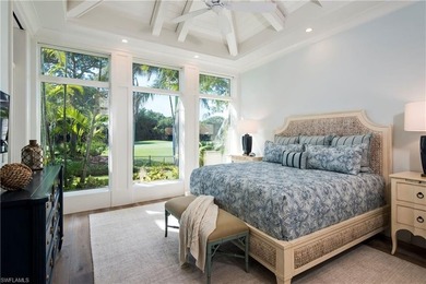 Discover refined coastal luxury in this exceptional estate on Club at Pelican Bay Golf Course in Florida - for sale on GolfHomes.com, golf home, golf lot