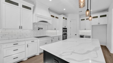 This beautiful two-story home, built in 2021, is located in the on Sugar Tree Golf and Country Club in Texas - for sale on GolfHomes.com, golf home, golf lot