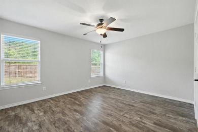 Welcome to your lakeside retreat! Nestled in the heart of on The Club At Runaway Bay in Texas - for sale on GolfHomes.com, golf home, golf lot