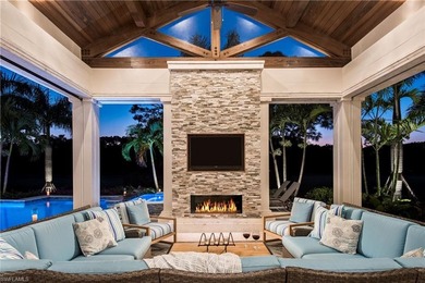 Discover refined coastal luxury in this exceptional estate on Club at Pelican Bay Golf Course in Florida - for sale on GolfHomes.com, golf home, golf lot