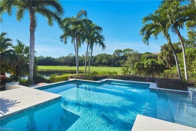 Discover refined coastal luxury in this exceptional estate on Club at Pelican Bay Golf Course in Florida - for sale on GolfHomes.com, golf home, golf lot