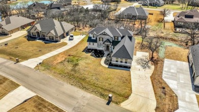 This beautiful two-story home, built in 2021, is located in the on Sugar Tree Golf and Country Club in Texas - for sale on GolfHomes.com, golf home, golf lot