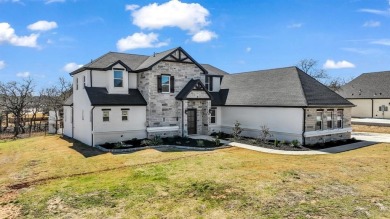 This beautiful two-story home, built in 2021, is located in the on Sugar Tree Golf and Country Club in Texas - for sale on GolfHomes.com, golf home, golf lot