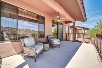 Experience luxurious living in this stunning property nestled on FireRock Country Club in Arizona - for sale on GolfHomes.com, golf home, golf lot