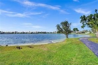 BEAUTIFUL LAKE VEW CONDO, RECENTHY PAINTED 1 BEDROOM 1 1/2 BATH on Flamingo Lakes Country Club in Florida - for sale on GolfHomes.com, golf home, golf lot