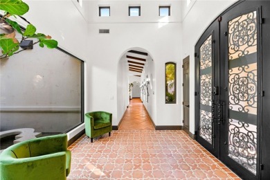 This 5,000 sq ft Spanish-style villa sits on one of the most on Bear Creek Golf and Country Club in California - for sale on GolfHomes.com, golf home, golf lot