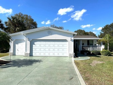 his stunning 2-bedroom, 2-bathroom home with a den offers 2,100 on Sun n Lake Golf and Country Club in Florida - for sale on GolfHomes.com, golf home, golf lot