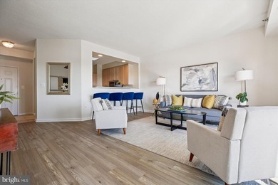 Sky-high living in this top floor condo with 2 spacious bedrooms on Leisure World Golf Club in Maryland - for sale on GolfHomes.com, golf home, golf lot