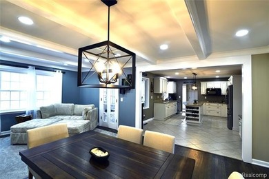 This beautiful brick home in Warwick Hills Golf Community offers on Warwick Hills Golf and Country Club in Michigan - for sale on GolfHomes.com, golf home, golf lot