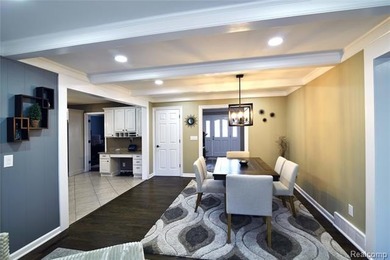 This beautiful brick home in Warwick Hills Golf Community offers on Warwick Hills Golf and Country Club in Michigan - for sale on GolfHomes.com, golf home, golf lot