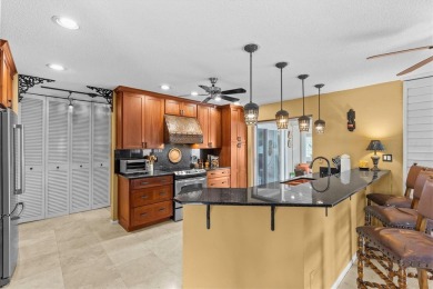 Welcome to this beautifully maintained home in the sought-after on The Dunedin Country Club in Florida - for sale on GolfHomes.com, golf home, golf lot