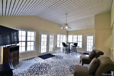 This beautiful brick home in Warwick Hills Golf Community offers on Warwick Hills Golf and Country Club in Michigan - for sale on GolfHomes.com, golf home, golf lot