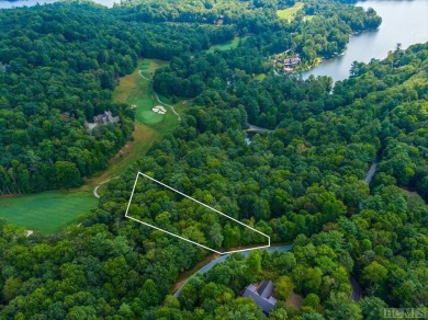 Build your dream home on the golf course with this 2.31 acre lot on Lake Toxaway Country Club in North Carolina - for sale on GolfHomes.com, golf home, golf lot