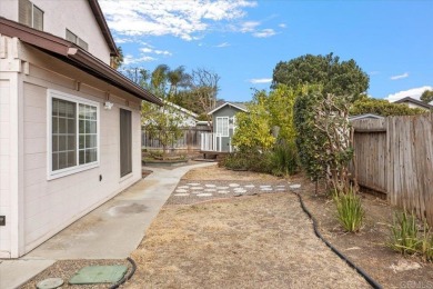 Welcome to this *darling-but-updates-needed* 4-bedroom on Escondido Country Club in California - for sale on GolfHomes.com, golf home, golf lot