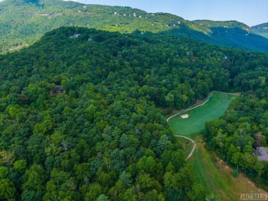 Build your dream home on the golf course with this 2.31 acre lot on Lake Toxaway Country Club in North Carolina - for sale on GolfHomes.com, golf home, golf lot