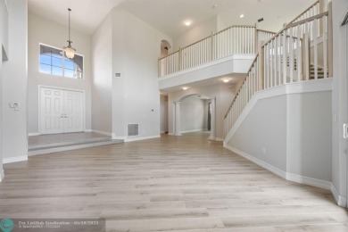 GL Homes built 2-story Rosewood Model features 5 BR, 4 Baths on PGA National Estates Golf Course in Florida - for sale on GolfHomes.com, golf home, golf lot