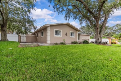 Welcome to this beautifully maintained home in the sought-after on The Dunedin Country Club in Florida - for sale on GolfHomes.com, golf home, golf lot